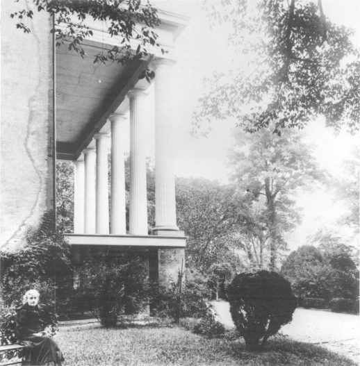 Van Lew Mansion, south portico, circa 1890. Elizabeth Van Lew is seated at left